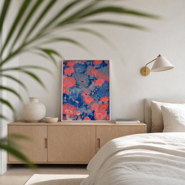 Small original coral reef painting hanging in a styled interior